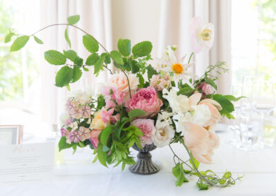 bouquet with white and pink flowers and green foliage