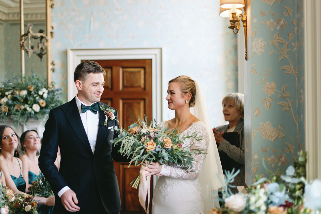 Bride and Groom at the altar in Drawing Room.