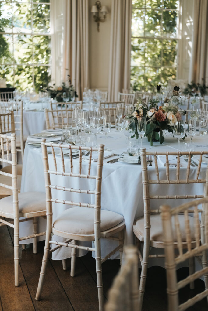 Wedding tables with flower bouquets.