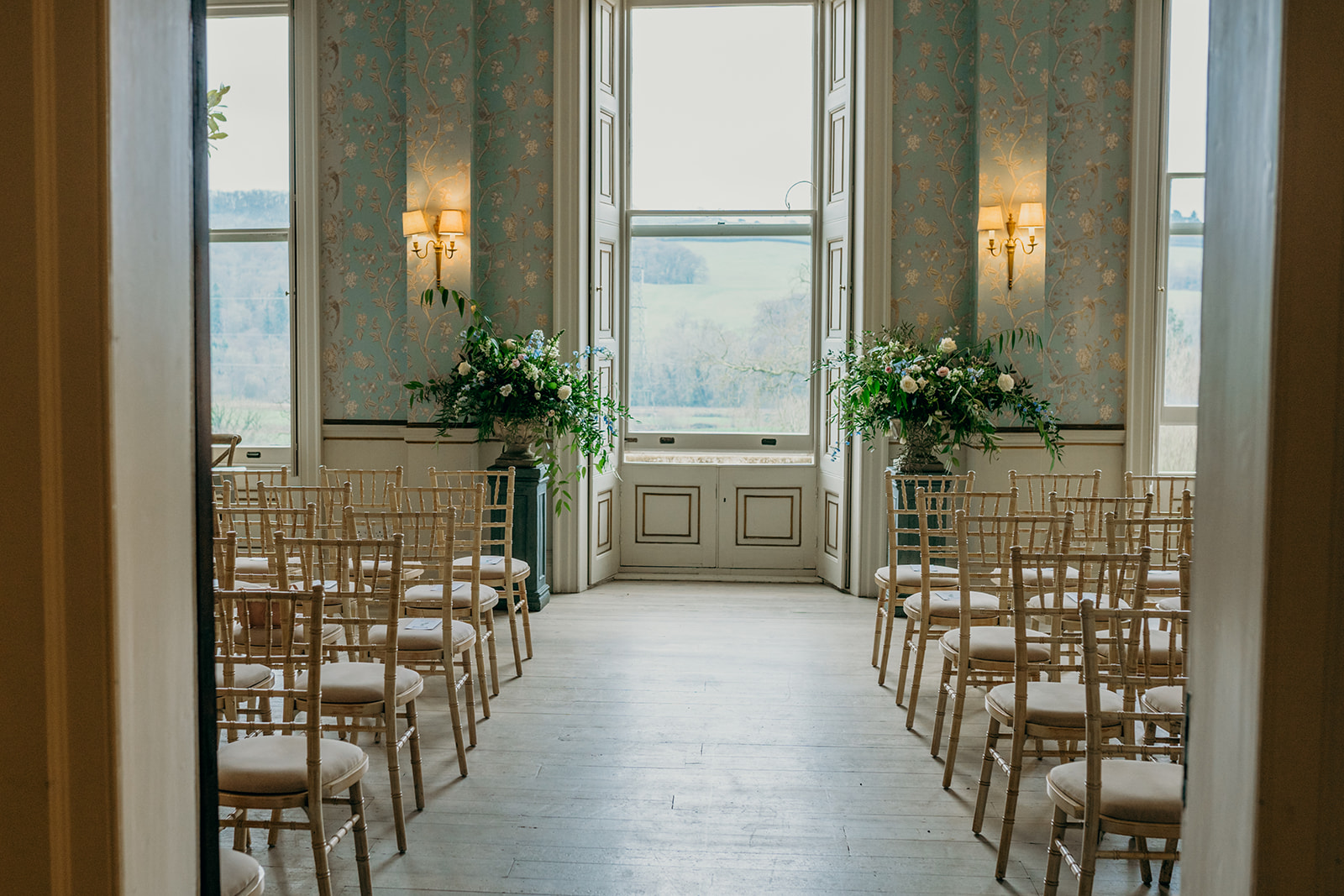 Drawing room set up for a wedding ceremony.