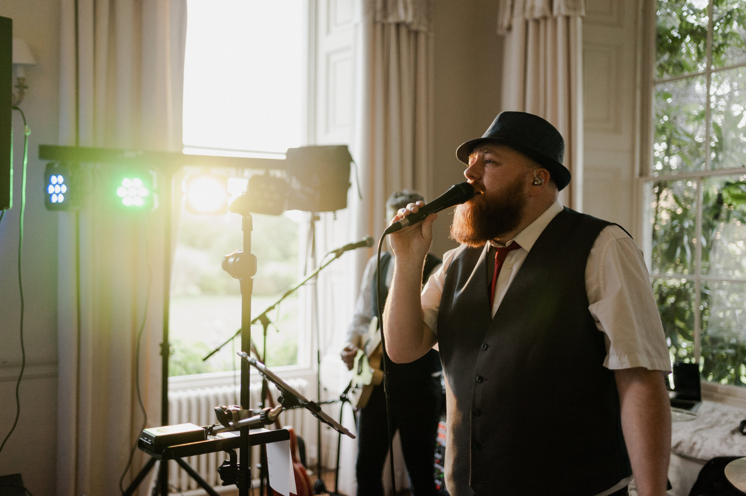 Man singing into a microphone.