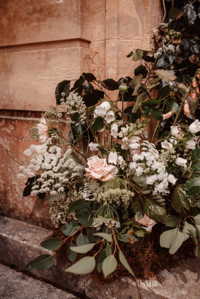 Floristry arrangement of pastel and white flowers, for English wedding.