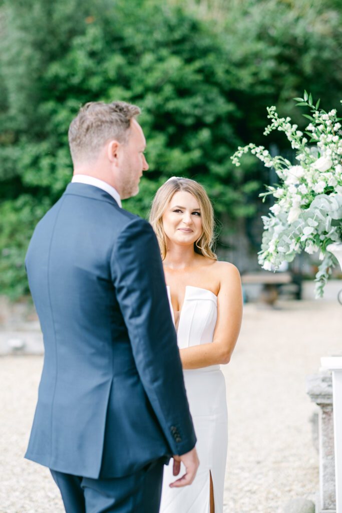 Bride and groom at the altar at luxury wedding venue in the UK.
