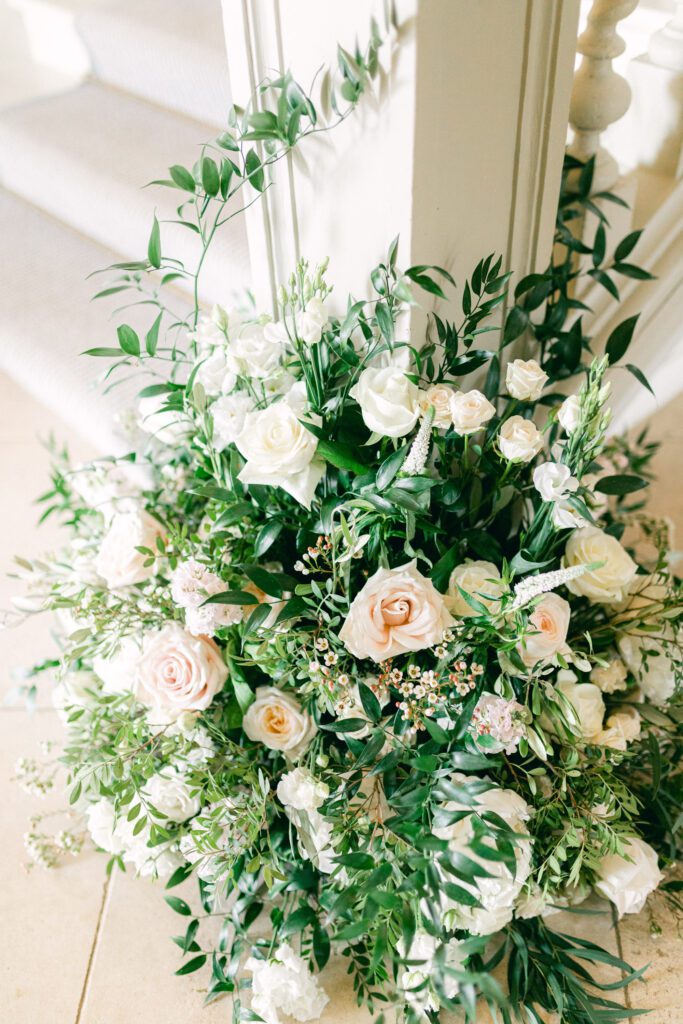Floral display of pastel flowers, for classic English wedding.