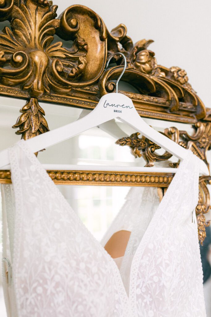 White wedding dress, on hanger.