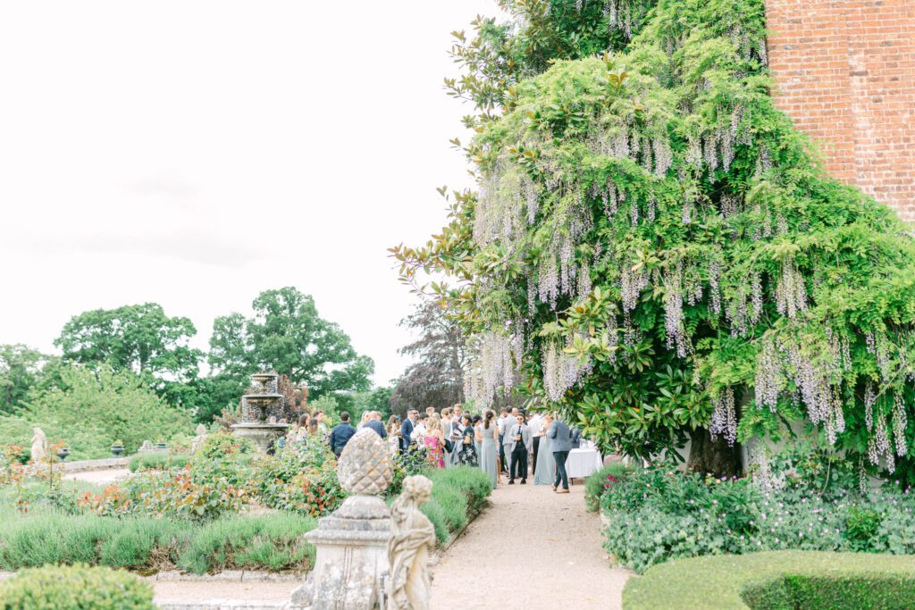 Bridgerton inspired gardens at English country house wedding venue in Devon.