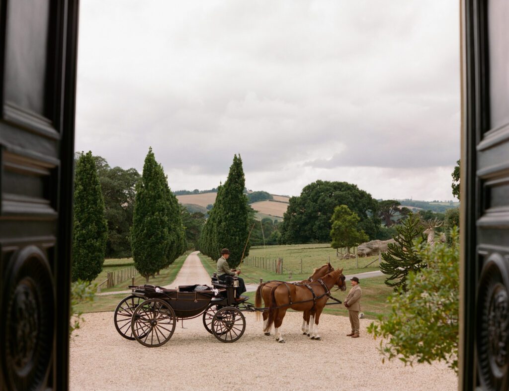 Bridgerton inspired wedding with horse carriage