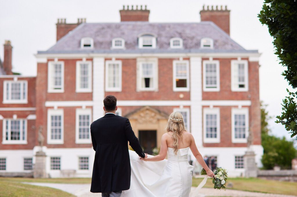 Bride and groom looking at their chosen wedding venue