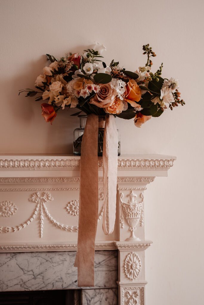 A luxury bouquet of warm coloured wedding flowers, by wedding florist, The Good Florist.