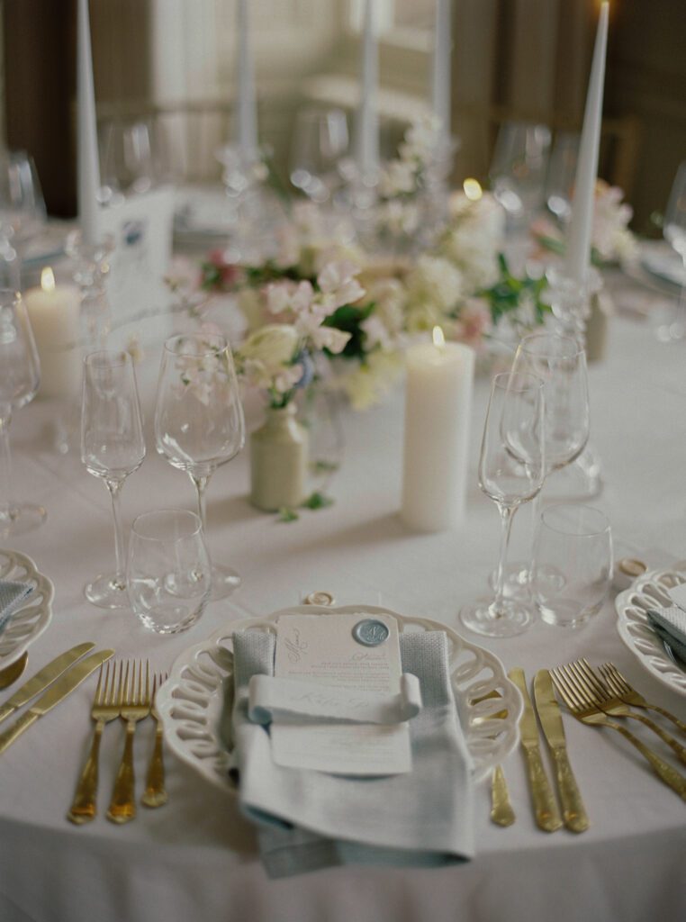 A place setting at a Bridgerton style wedding reception at Pynes House