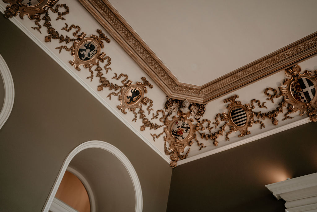 Historic family crests at a country house in England.