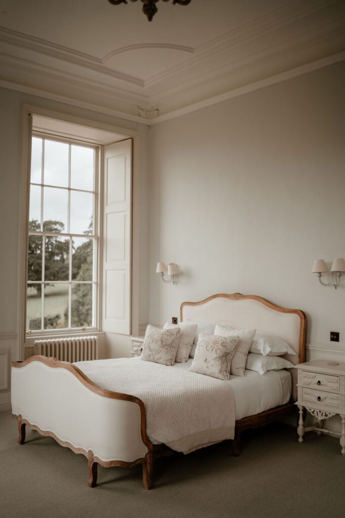 A historic bedroom at Pynes House wedding venue.