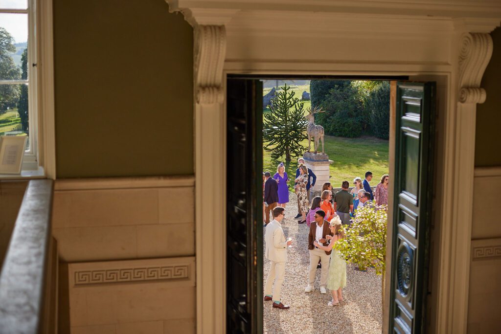 Guests mingle during a weekend wedding.