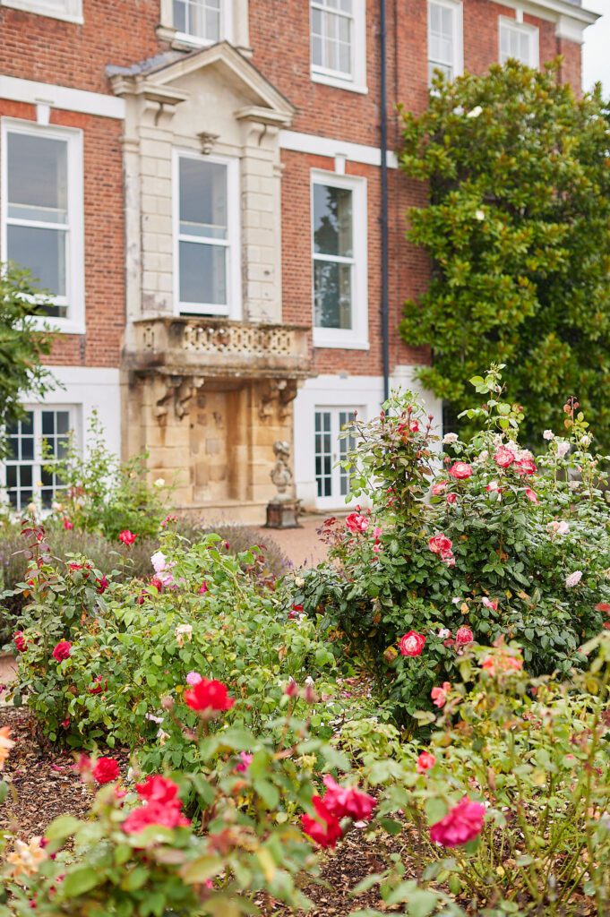 The rose gardens at an English country house wedding venue.