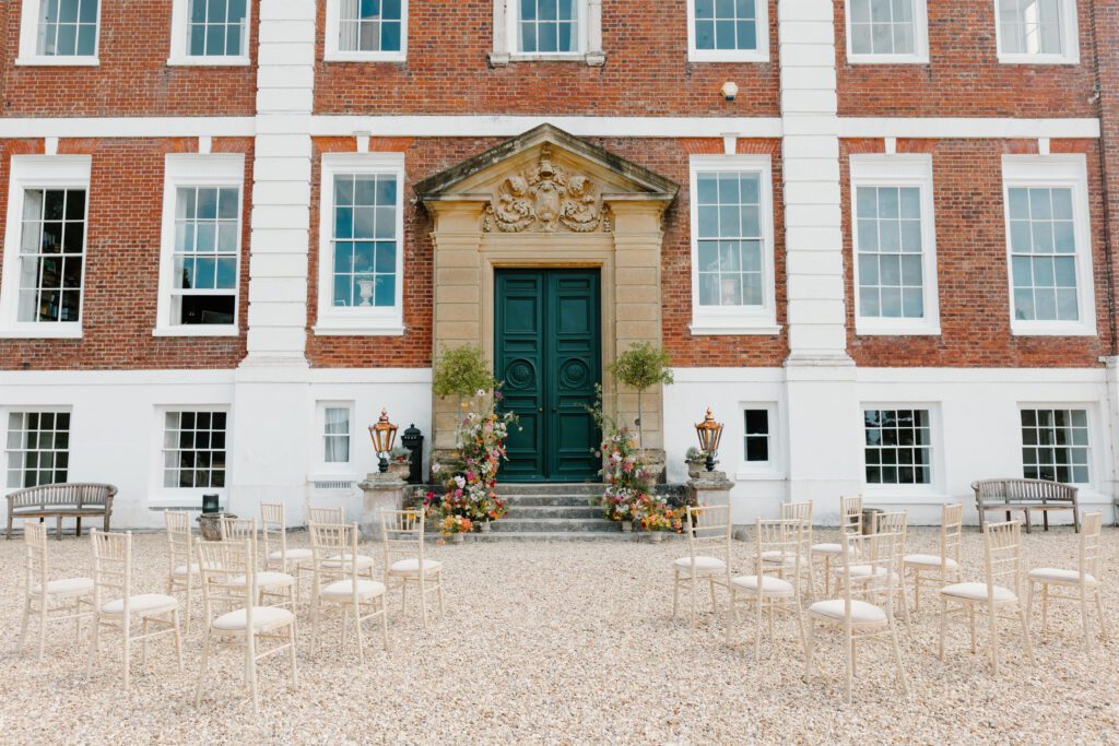A summer wedding ceremony at an English country house